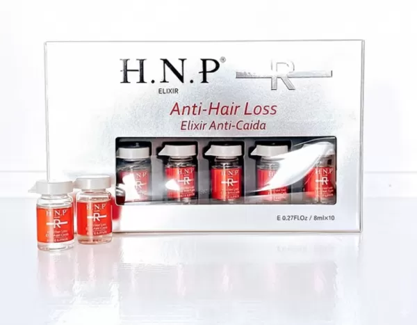 Elixir anticaída H.N.P en caja plateada con 10 ampollas de 8 ml para el cabello, con dos ampollas rojas fuera de la caja