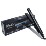 Plancha para cabello profesional ElectroBell Pro modelo Black Diamond. Se muestra la plancha abierta en color negro con detalles en plata, junto a su caja de lujo negra. En el empaque se destaca 'Recommended for Keratin Treatments', '480°F', 'Titanium Plates' y su función '2 in 1' para alisar y crear ondas.