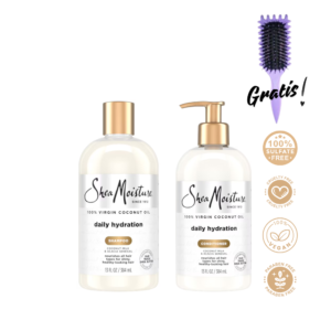 Kit de cuidado capilar Shea Moisture 100% Virgin Coconut Oil Daily Hydration que incluye dos envases blancos con tapas doradas (Champú y Acondicionador en formato dosificador) junto a un cepillo morado con la palabra Gratis. A la derecha se muestran sellos dorados que certifican: 100% Sulfate Free, Cruelty Free, 100% Vegan y Paraben Free